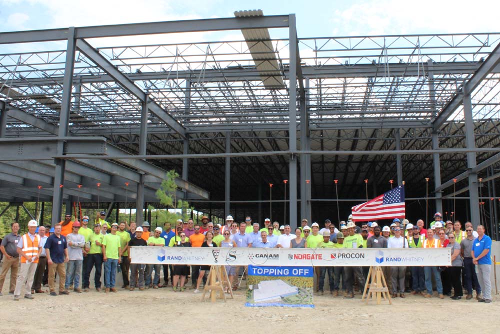 Rand-Whitney Signs and Raises Final Beam on its 373,500 SF Packaging and Manufacturing Facility